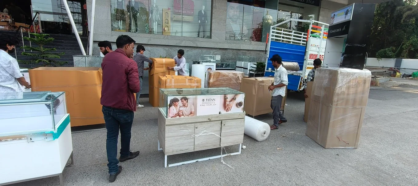 Professional moving team handling local commercial shift